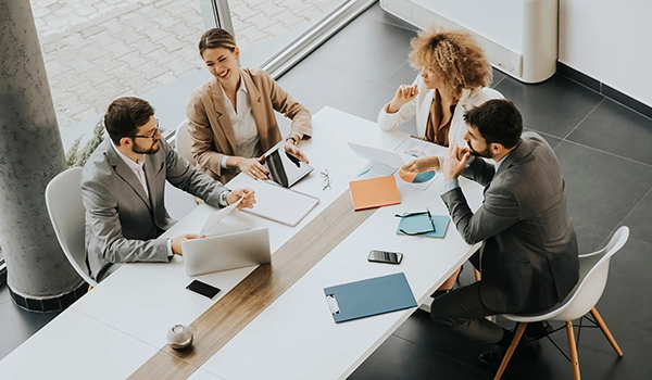 people meeting to discuss business case